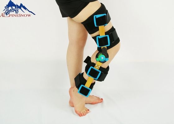CINA Bahan SBR medis Adjustable Hitam Ortopedi Retainer Knee Braces Produk Berengsel pemasok